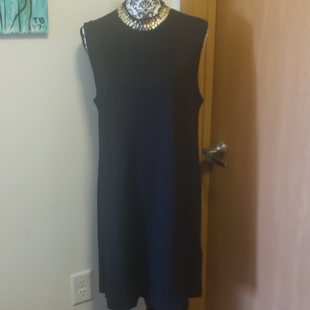 H&M sleeveless dress with rhinestones in black.